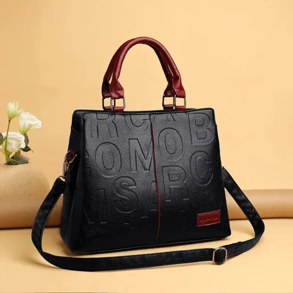 2023 New Fashion Solid Color Shoulder Large Capacity Soft Leather Cloth Letter Embossed Ladies Handbag - Image 2