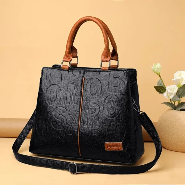 2023 New Fashion Solid Color Shoulder Large Capacity Soft Leather Cloth Letter Embossed Ladies Handbag - Image 3