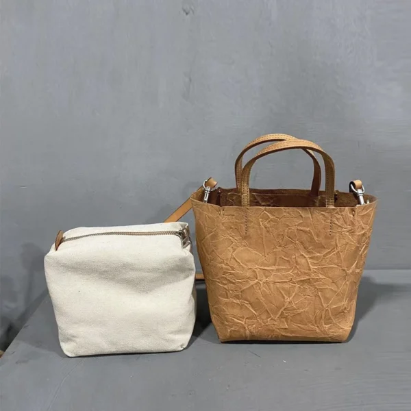 2023 New Bag Women's Vegetable Tanned Cowhide Women's Bag Handheld One Shoulder Retro Art Hand Grab Pleated Tote Bucket Bag - Image 3