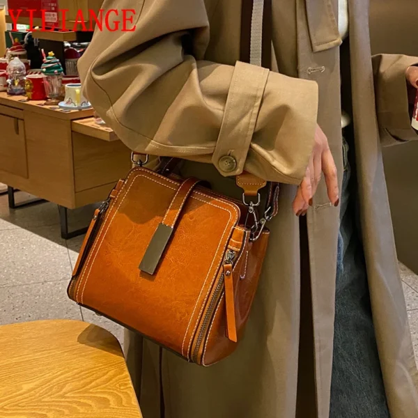 Women's shoulder bag leather zipper buckle  Vertical Square first layer cowhide bucket Handbag  Square street trend Women's bag